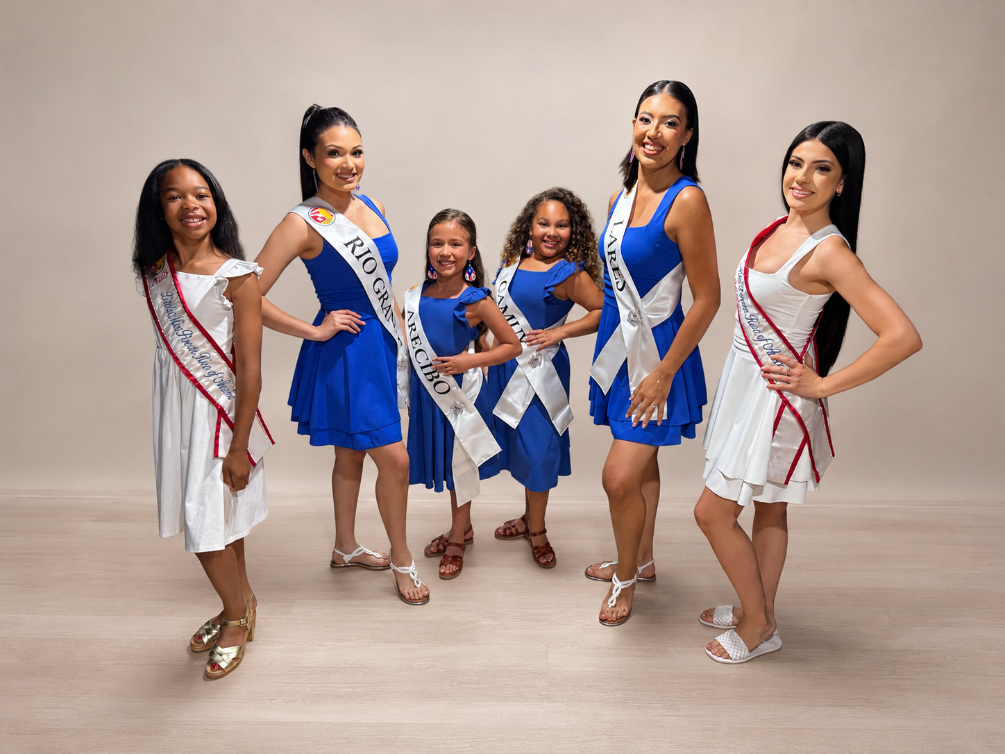The outgoing court in white joins the 2026 titleholders at the APRCC pageant.