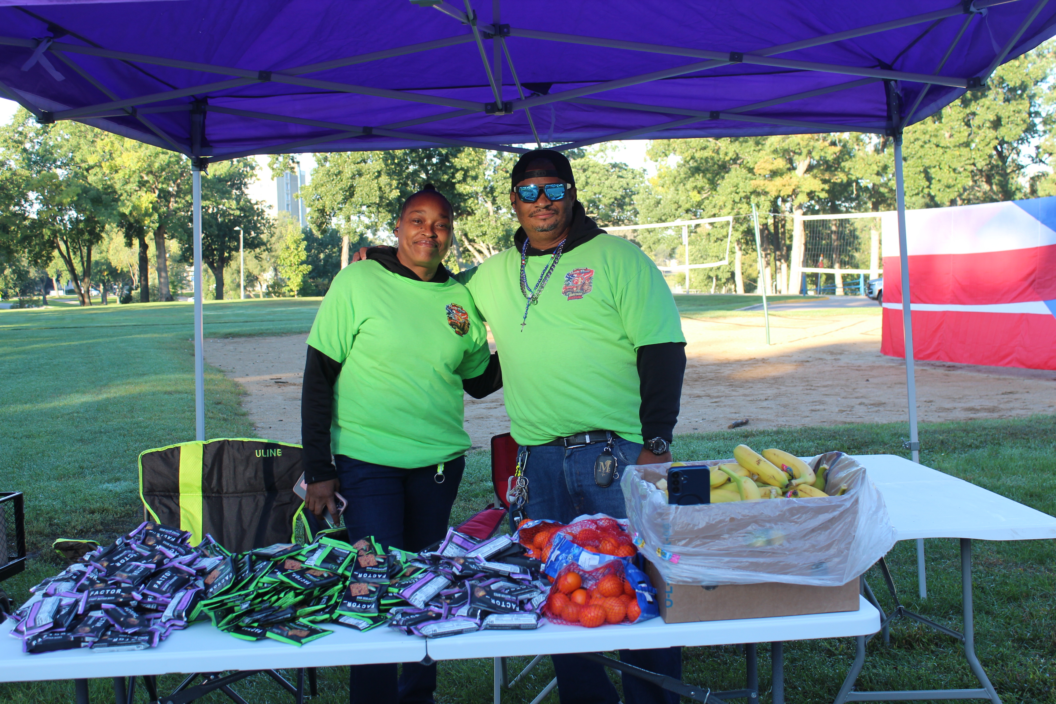 The Factor_ team providing refreshments for Coquí 5K participants